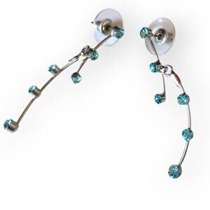 Dainty silver tone pale blue rhinestone jointed post earrings